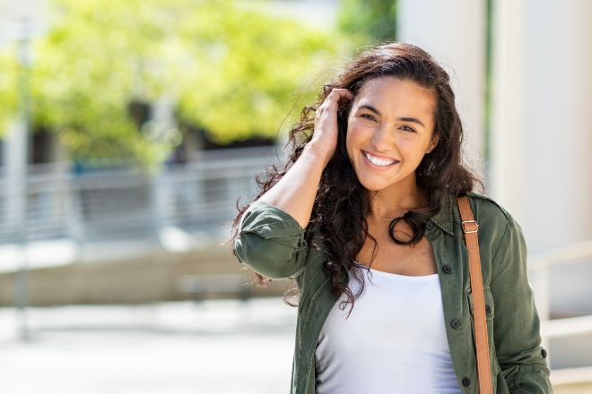 Happy college student shows how counseling for anxiety, depression, stress and trauma can help students be successful at Penn State Harrisburg and other colleges in central Pennsylvania