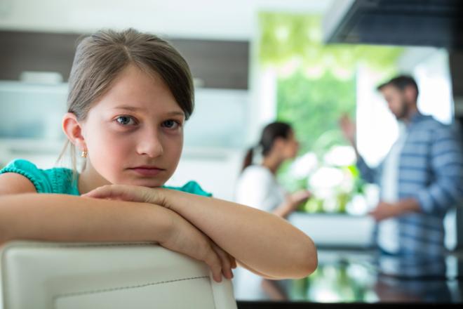 Anxious and depressed child due to parent’s argument and fighting worried about their family dynamics and potential divorce near Harrisburg, PA