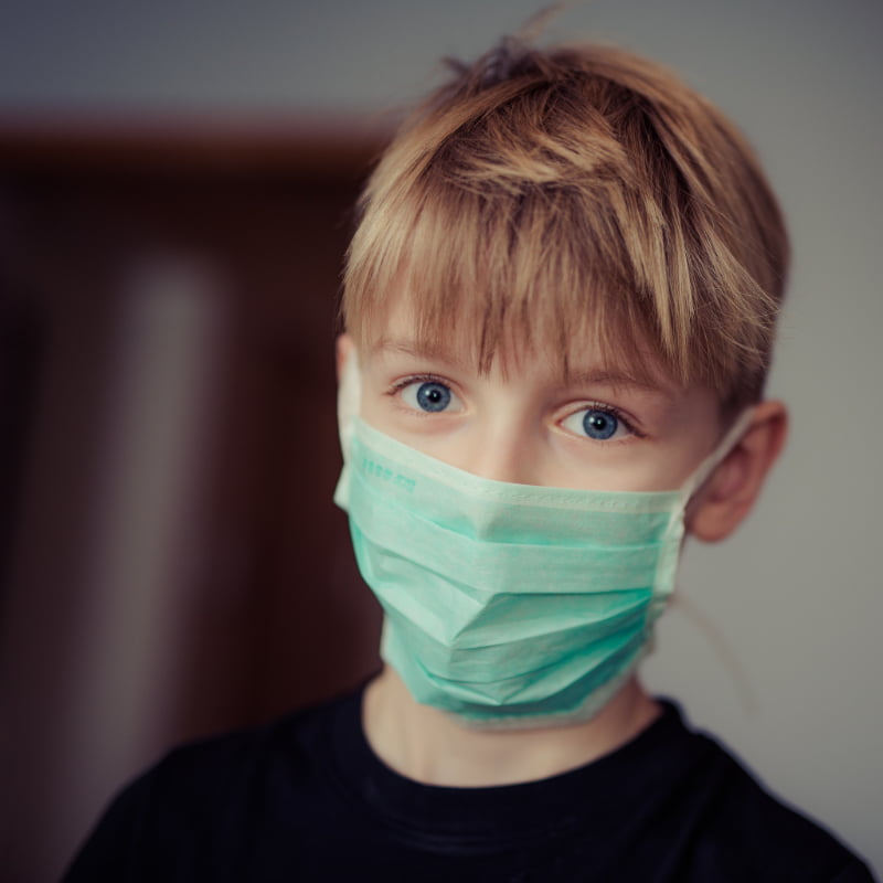 Adolescent with anxiety due to wearing mask required from coronavirus COVID-19